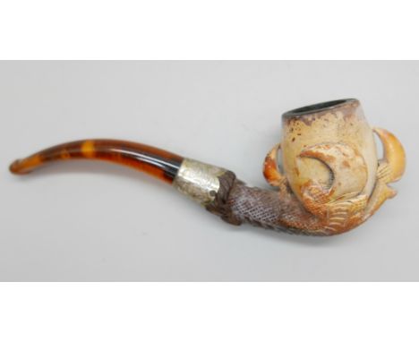 An early 20th Century eagle's claw, pipe, with amber stem and silver collar, cased Meeerschaum 
