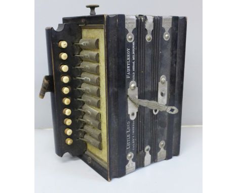 An accordion marked Goldene Staats, Medaillle, Melbourne, Little Lord Fauntelroy 