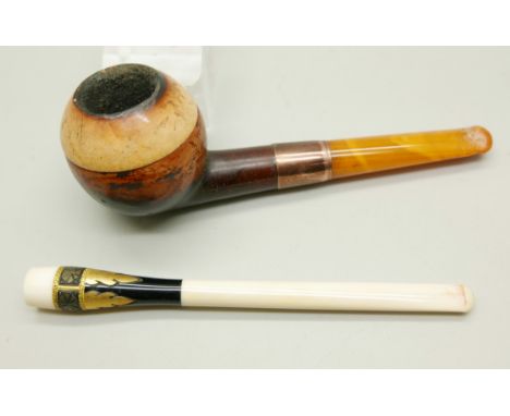 A smoker's pipe with a 9ct gold collar and a cigarette holder, both cased 