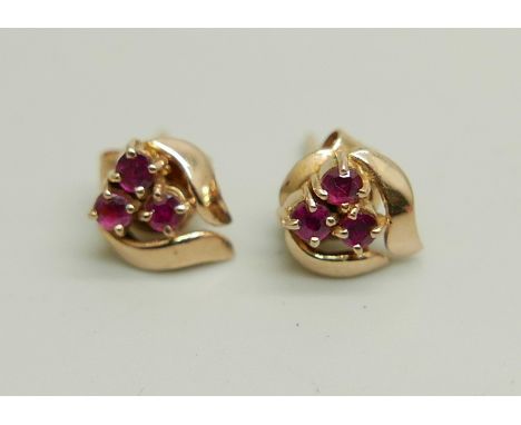 A pair of 14k gold and ruby earrings, 1.5g 