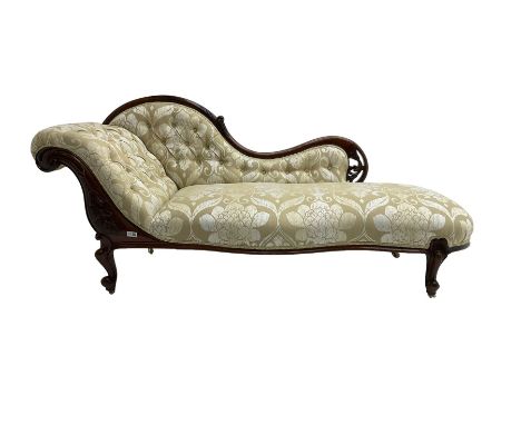 Victorian mahogany chaise longue, scrolled back with pierced and floral carved decoration, champagne foliate pattern fabric, 