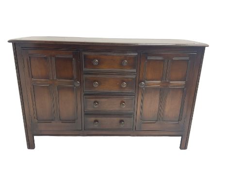 Ercol - elm sideboard, fitted with four drawers and cupboardsDimensions: Height:&nbsp;90cm&nbsp; Length/Width:&nbsp;146cm&nbs