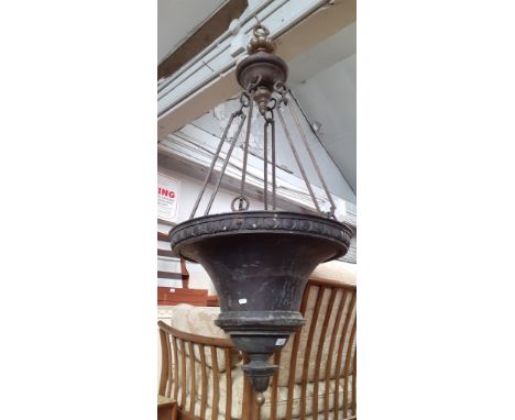 A large Victorian copper and brass light fitting. 