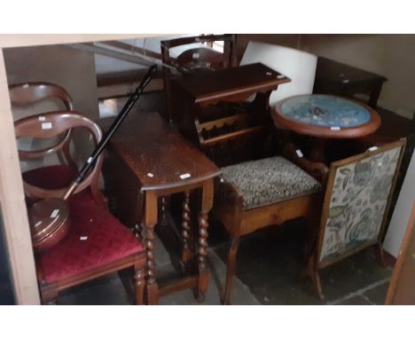 Various items of furniture; an oak twist leg table, two round top pedestal tables, a standard lamp, a fire screen, a Lancashi