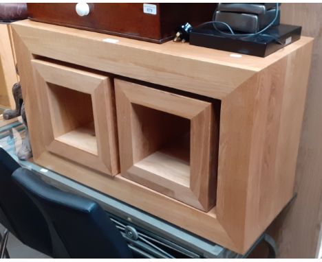 A modern light oak nest of tables. 