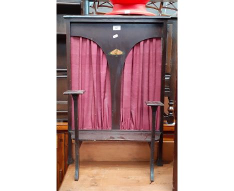 An Edwardian Arts and Crafts fire screen. 