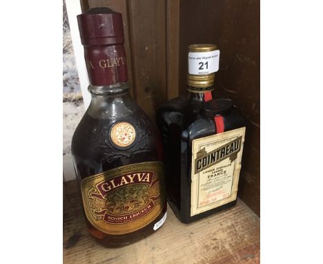 A bottle of Cointreau and a bottle of Glayva Scotch liquer. 