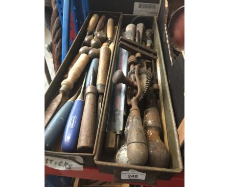 Two metal boxes of wood chisels, wood working tools and wood carvers. 
