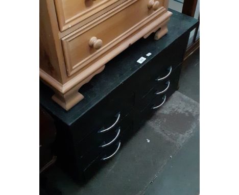 A joiners multidrawer toolbox on castors. 