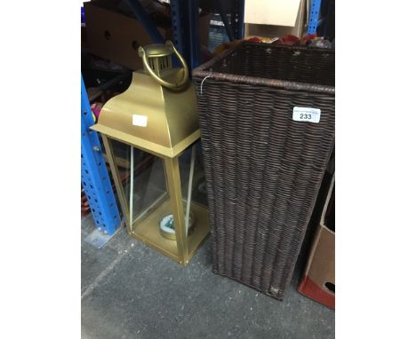 A large lantern and a wicker basket. 