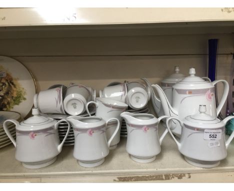 36 piece fine quality porcelain tea set for 10 including 2 teapots, 2 sugar basin, and 2 milk jugs 