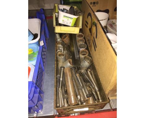A mixed box of engineering tools and equipment. 