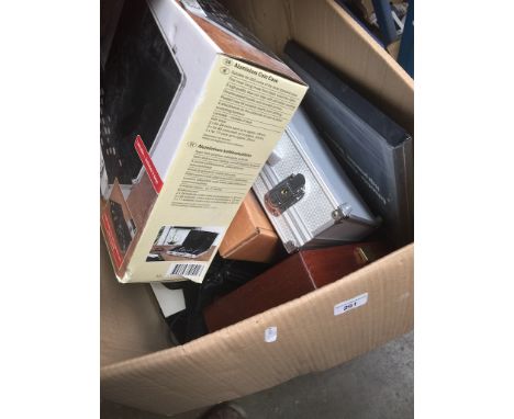 A box of misc including Dell projector with accessories, coins aluminium cases, electronics, headphones, etc. 