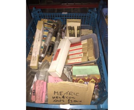 A box of metric heli coil taps and insert tools. 