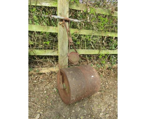 Vintage cast iron garden roller stamped 'John Barker &amp; Co Ltd. London', with later tubular handle 