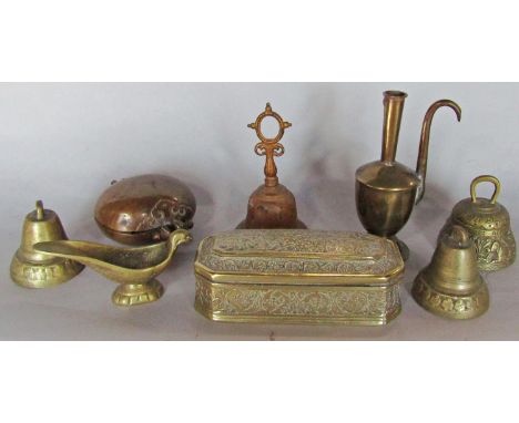 A Tibetan copper Gao, an Indian brass bells oil lamp in the form of a bird, oil jug, a brass engraved trinket box and two fur