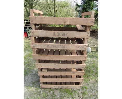 A stack of eight vintage wooden rectangular potato trays/crates, some with printed lettering R. Chester  and W E Franklin, 75