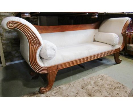 Regency style sofa with swept outline and reeded supports 