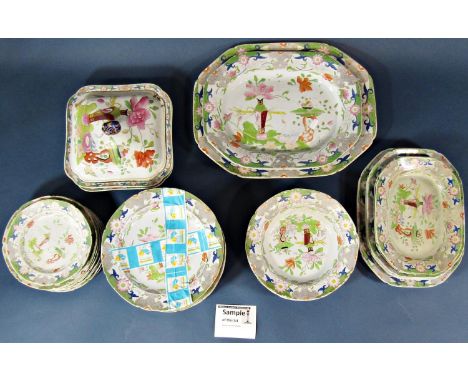 A collection of ironstone china dinner wares comprising two lidded tureens and further tureen, eleven rectangular meat plates