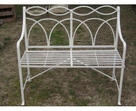 A Regency style two seat steel framed garden bench, with decorative strap work detail and painted finish, 102cm wide 