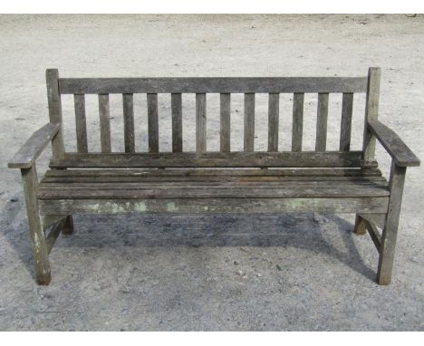 An R A Lister weathered Burma teak three seat garden bench with slatted seat and back, 160 cm wide 