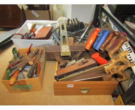 A large quantity of workshop tools to include saw, planes, vices, screw drivers, etc 