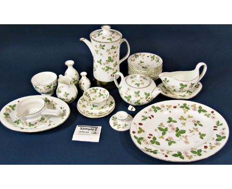 A collection of tea, coffee and dinnerwares by Wedgwood in the Wild Strawberry pattern comprising coffee pot, milk jug, two s