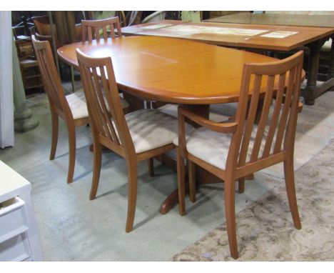 A G plan extending dining table with single additional leaf raised on four splay supports, together with a set of six (4&amp;