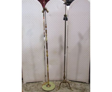 A brass and onyx lamp standard of full height and one other in brass 