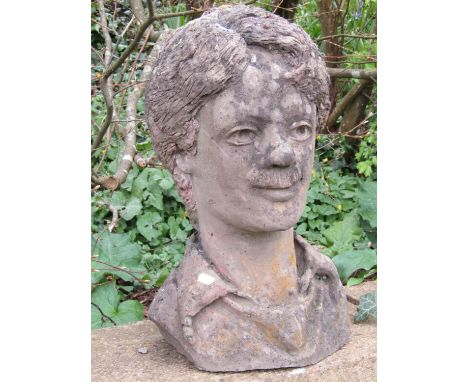 A weathered clay bust of a male character with moustache and shredded hair, 42 cm high, together with one other of a female n