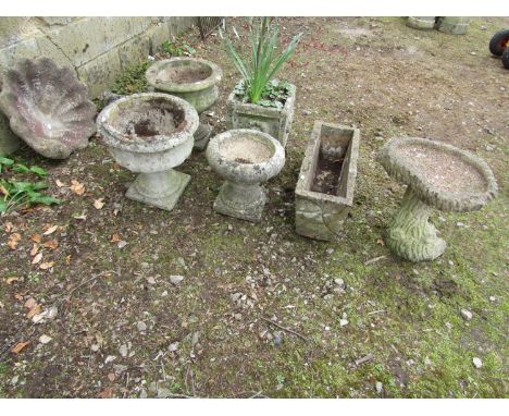 Six weathered cast composition stone garden planters of varying size and design including a pair, a small two sectional bird 