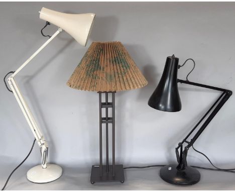 A cream Anglepoise lamp stamped Herbert Terry and sons Ltd , Anglepoise Trade Mark and another black lamp of similar design t