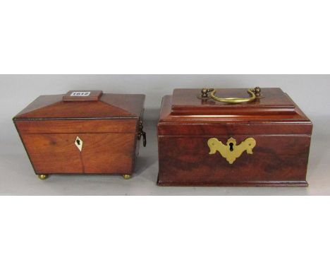 A Georgian sarcophagus mahogany tea caddy and another later example. 