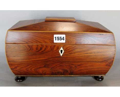 A Regency rosewood sarcophagus tea caddy with satinwood stringing raised on bun feet. (no interior) 30cm x 19cm high 