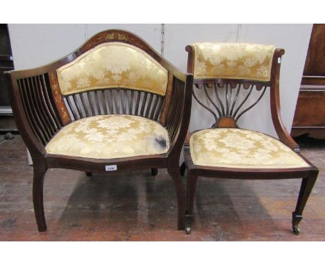 An inlaid Edwardian mahogany and rosewood tub chair with stick back and sides, shaped supports and a further drawing room cha