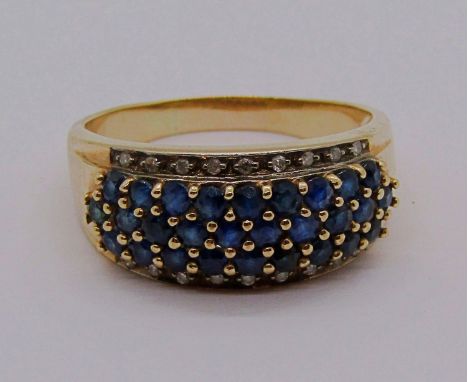9ct sapphire and diamond bombe type ring, size U/V, 5.2g 