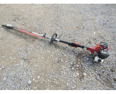 A petrol 52cc garden combi tool engine, with hedge cutter 