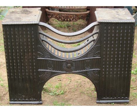 A Regency cast iron fire grate with repeating geometric detail, 82cm wide, together with a number of ceramic tiles 