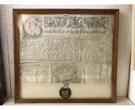 A George III sealed vellum manuscript, framed and glazed, approx. 90 x 81 cm 