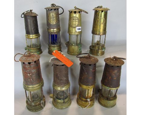 A brass miners lamp The Protector makers Eccles Manchester, a Thomas William example from Aberdare Wales, and six other examp