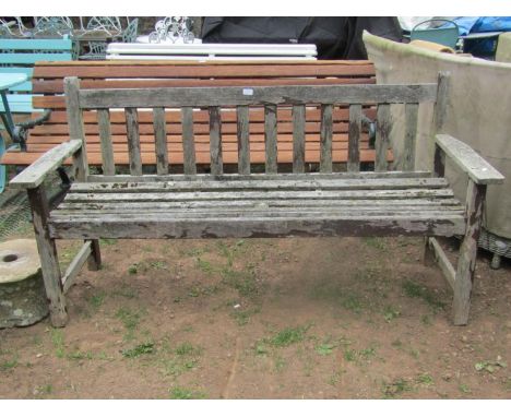 A vintage Lister weathered teak three seat garden bench with slatted seat and back, 160 cm long 