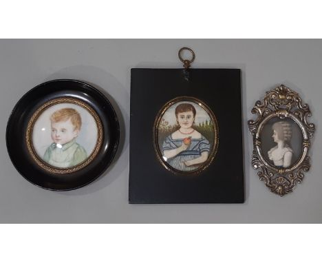 (English School, 19th Century) Two miniature portraits of a girl holding an apple and a boy in miniature wooden frames; toget