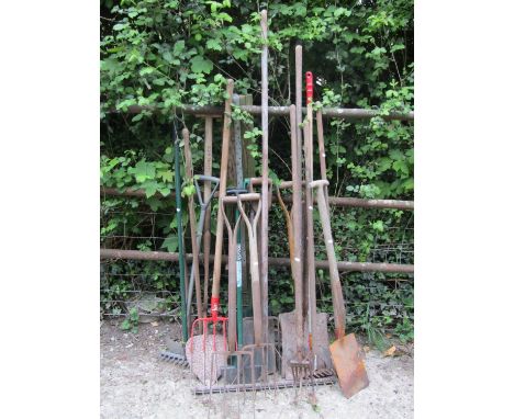 A quantity of vintage and later long handled gardening tools etc 