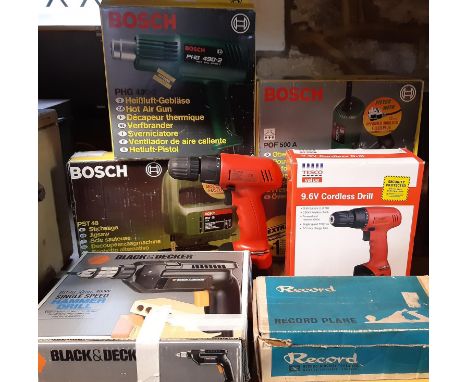 A collection of little used electrical workshop tools including Bosch router, Bosh jigsaw and hot air gun, record plane and t