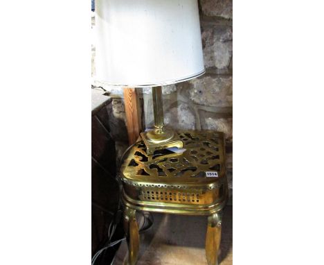 A 19th century brass and iron footman fireplace stool, 31cm w x 32cm d x 34cm h and a contemporary brass finished column tabl