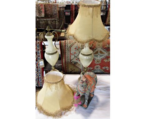 A pair of vasiform alabaster table lamps with gilt decoration and shades. 63 cm high lamp only. 