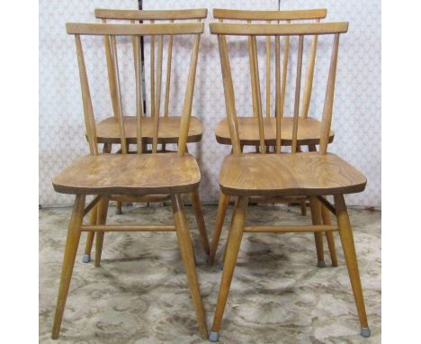 Set of four Ercol stick back dining chairs in elm and beechwood 