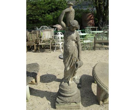 A weathered cast composition stone garden statue/water feature in the form of a classical standing water maiden with urn and 