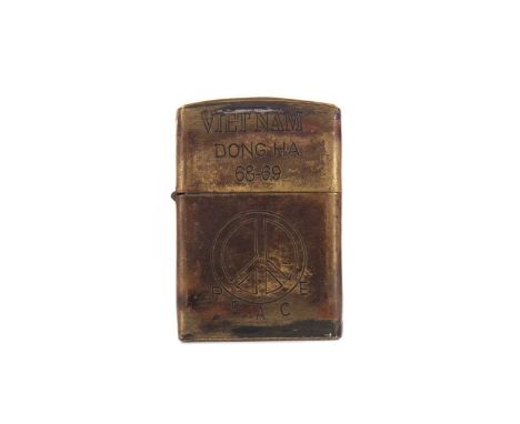 VIETNAM WAR PERIOD ZIPPO LIGHTER,the obverse inscribed 'VIETNAM DONG HA 68-69' and with peace symbol, the reverse 'ONE THOUSA