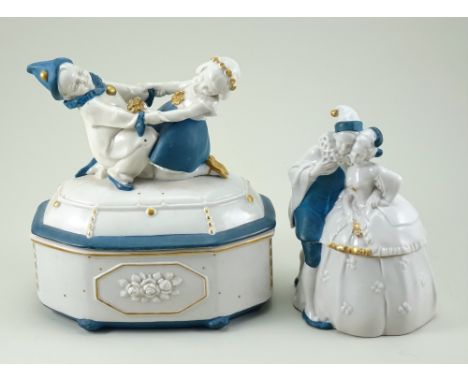 Pair of Hertwig glazed china dressing table boxes, 1920s, white china boxes with gold decoration, larger with young Pierrot a